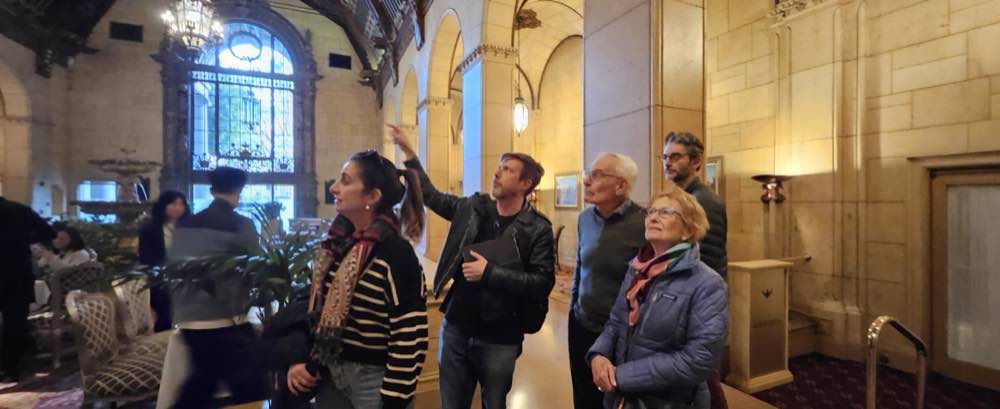 Guests discover the Biltmore's Rendezvous Court with their guide.