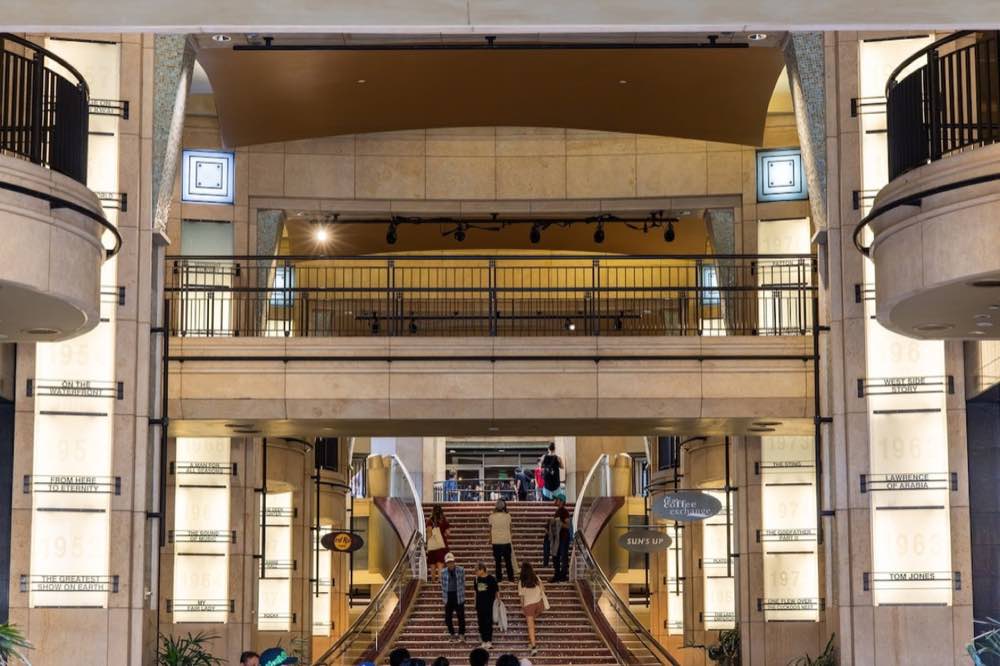 The Dolby Theatre approach, with Oscar winning film titles on illuminated pillars.